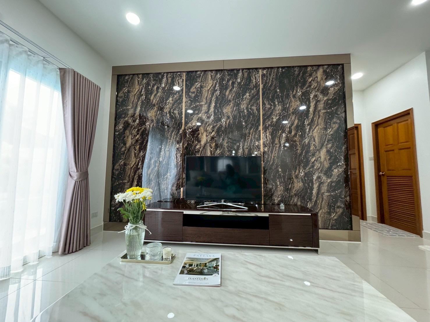 Living room with marble feature wall