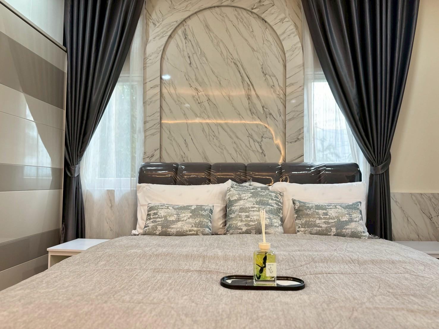 Bedroom with marble feature wall